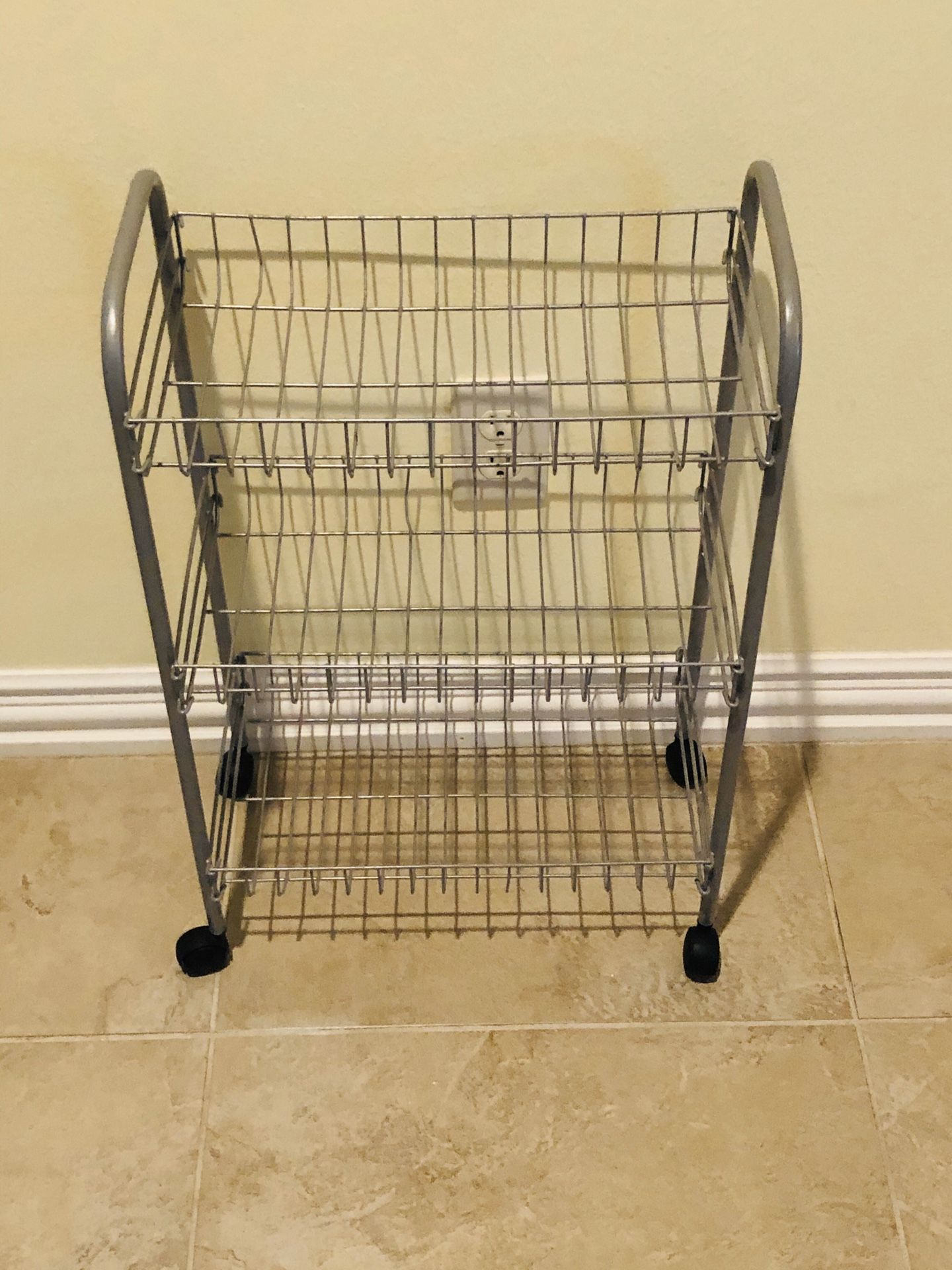 Small metal rack with 3 shelves & casters 24”