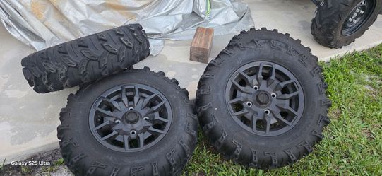 Honda pioneer rims n tires