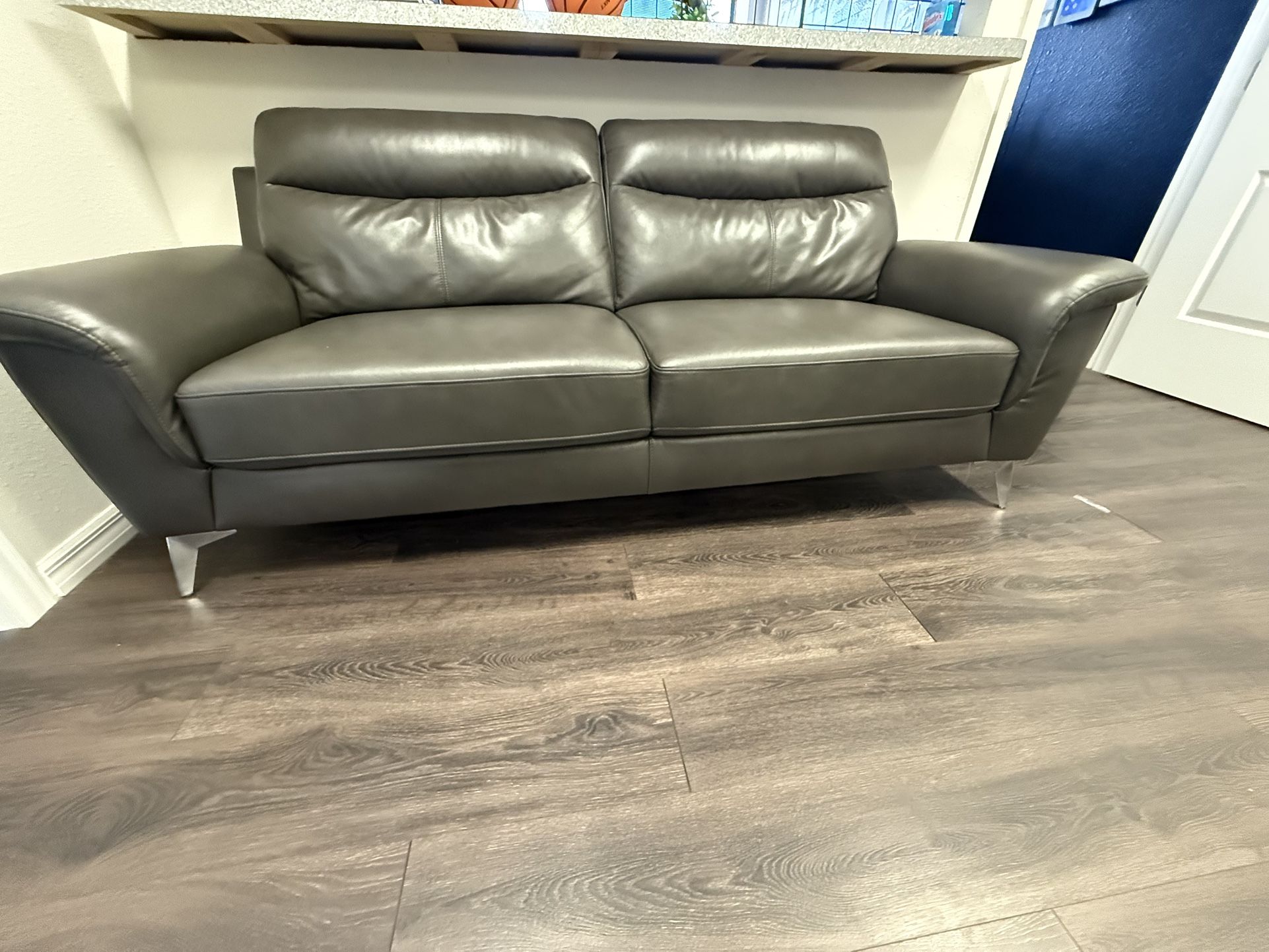 Two Leather Couches from Rooms To GO