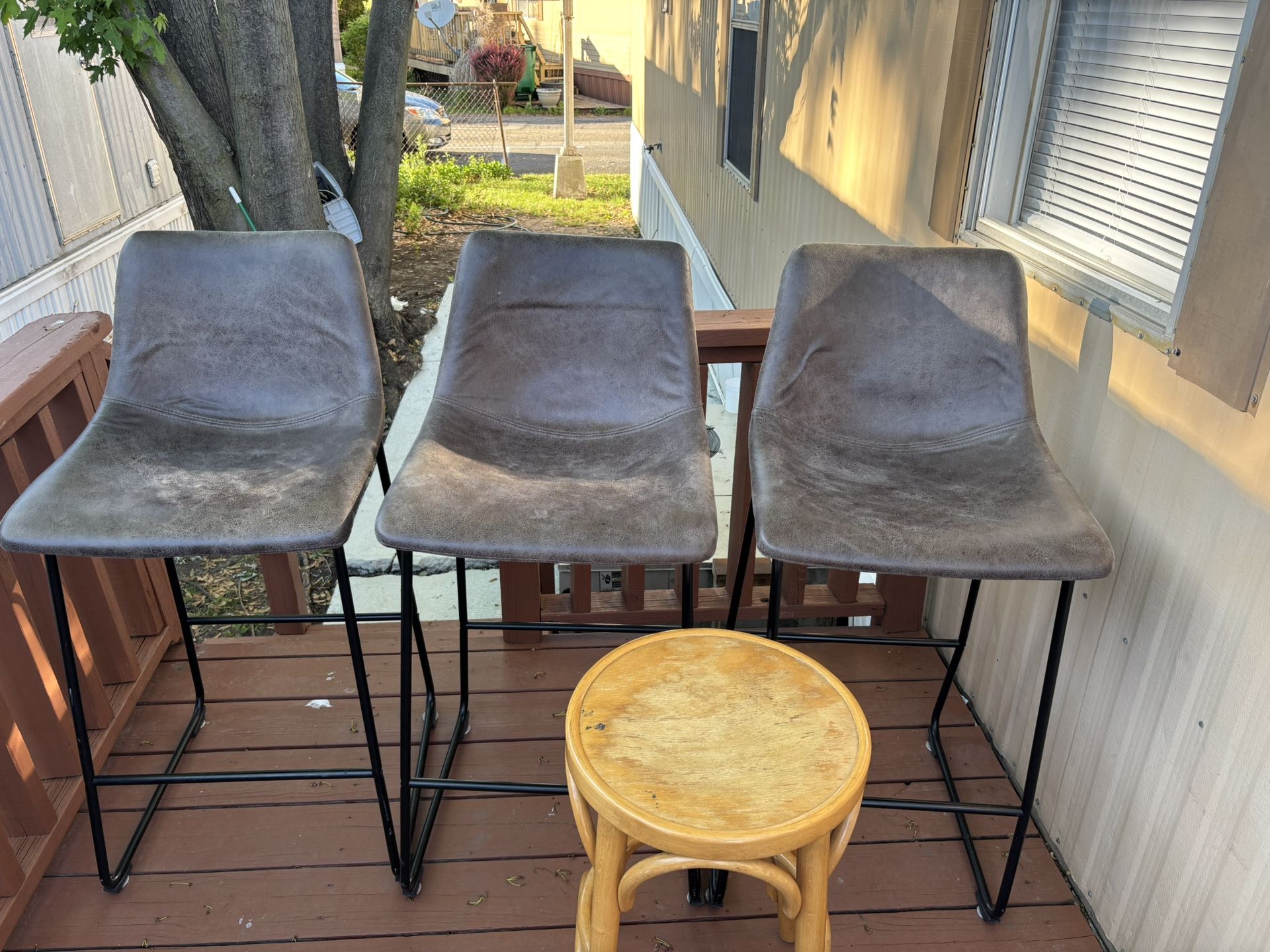 Three Used Barstools and one small Stool for 65$