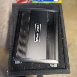 Powerbass dual 12” subwoofer box with Powerbass 600W amp – complete setup.” 