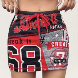 SHEIN Red and Black Graphic Mini Skirt Bold mini skirt with graphic print. Features red and black design. Perfect for a trendy look.