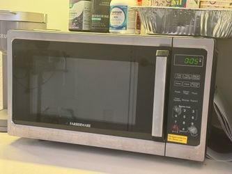 Microwave, electric kettle, Kuerik Coffe maker.