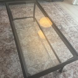 22x40 glass black metal coffee table