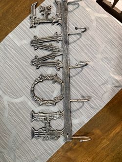 Home Heavy Metal Coat/Apron/Hook Hanger 16.5”x6.7” - asking $8.00 - pick up only