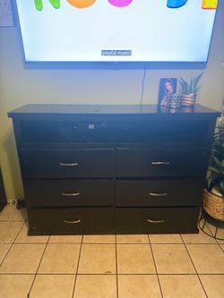 Wooden TV stand with drawers