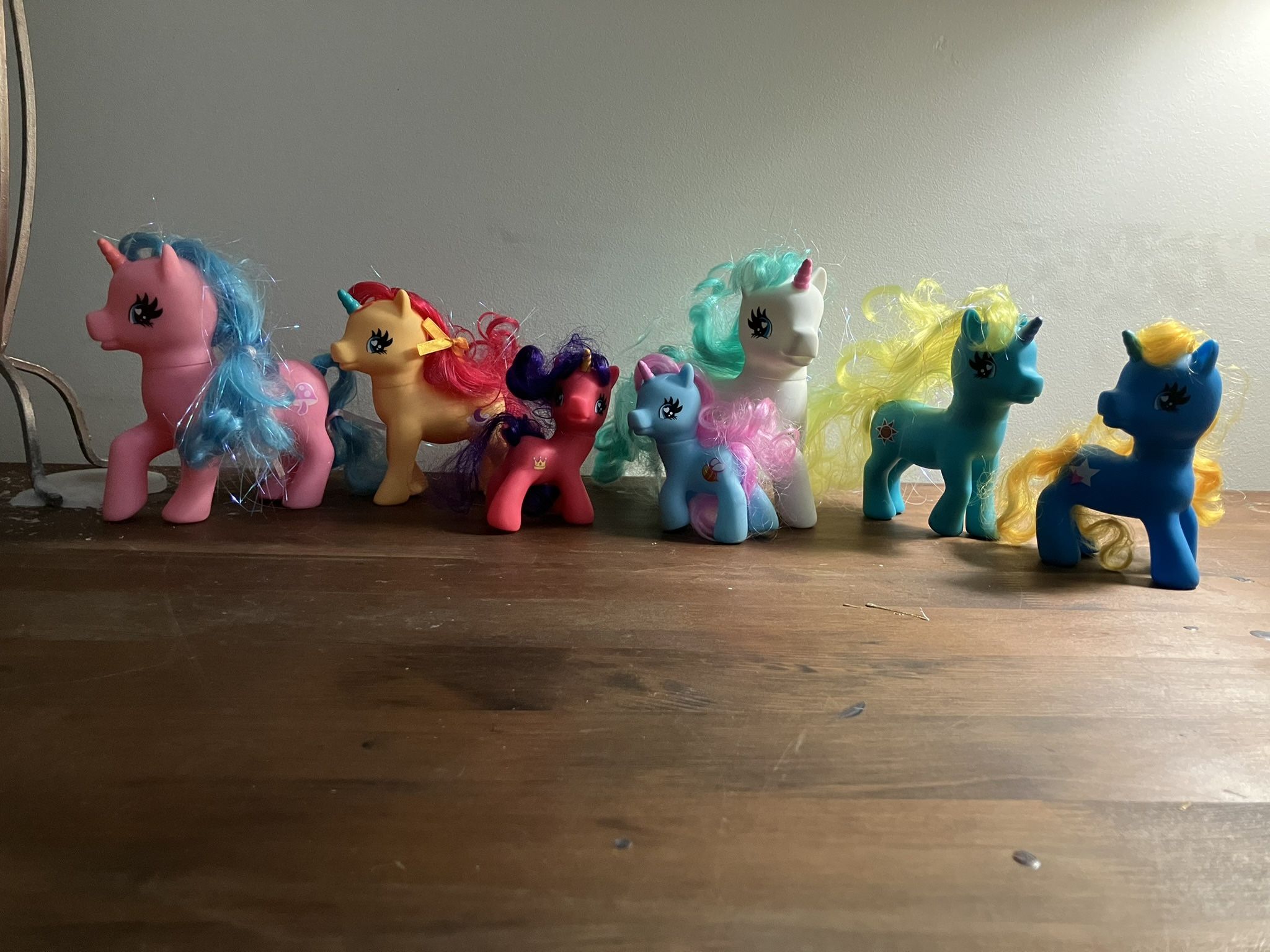 My Little Pony figures, likely from the Mini Classics line, which are reminiscent of the retro ponies.