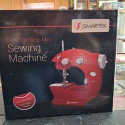Smartek RX-08 Mini Sewing Machine with a foot pedal.