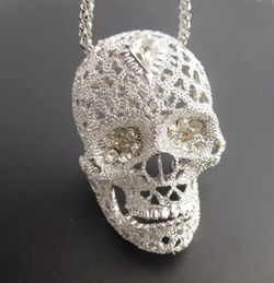 Silver colored skull necklace