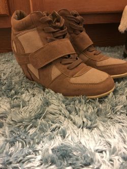Brown wedge boots size 5.5