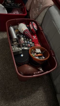 And those two containers I have sports autograph, footballs, autograph pictures and it’s a whole bunch of collectibles a whole bunch of stuff too many