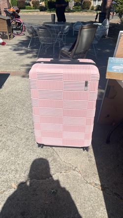 Large pink luggage