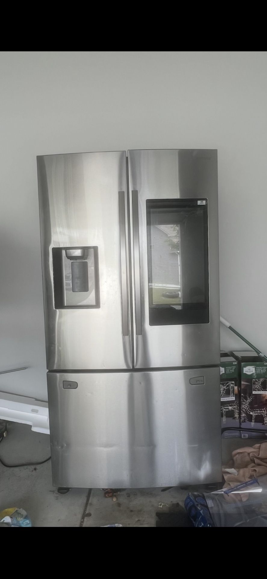 LG Smart InstaView French-Door Refrigerator with ThinQ screen.