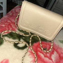 Tan Bebe purse.