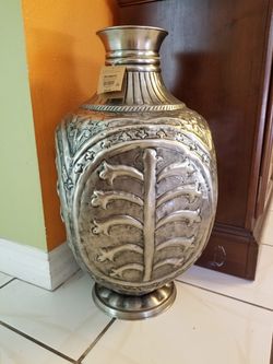 Two feet tall and one foot wide Pier Imports metal vase