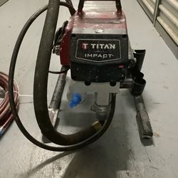TITAN 440 AIRLESS PAINTER IN EXCELLENT CONDITION ONLY USED 3 TIMES