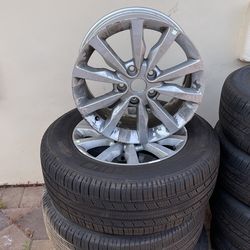 Qty 4  - 18” Aluminum Chrysler Rims With 3 Almost New Tires