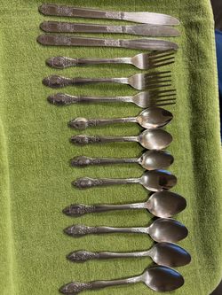 14 PIECES LIGHTWEIGHT FLATWARE.