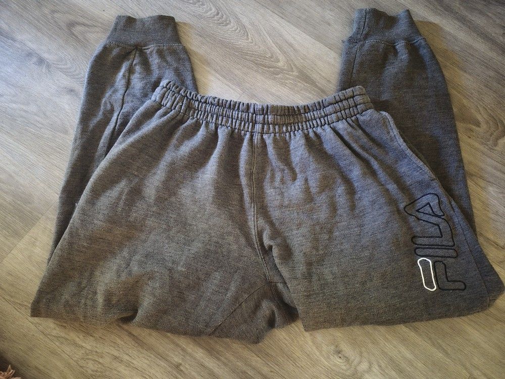 NEVER WORN GRAY FILA SWEATPANTS! SIZE:MEDIUM ( WITH SIDE FRONT POCKETS!)