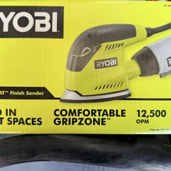 New sealed RYOBI 1.2 Amp Corded 5.5 in. Corner Cat Sander with Dust Bag, Sample Sandpaper, and bag