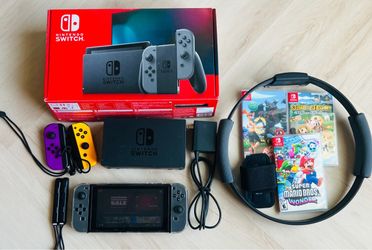 Nintendo Switch + case + Ring Fit + Mario wonder + Story of Seasons ($225)