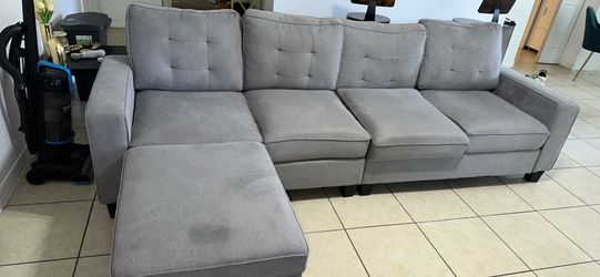 Gray 4 seater Sofa with storage ottoman