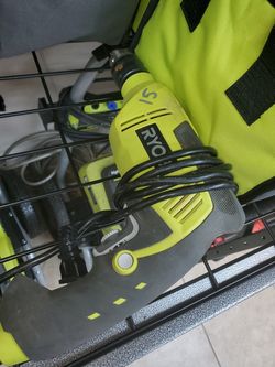 Ryobi 1/2" hammer drill 15$
