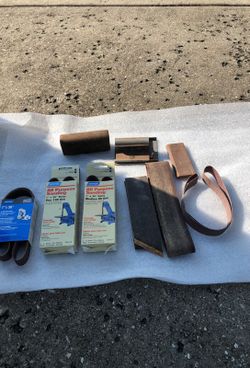 Lot of norton assorted sanding belts and assorted sandals blocks