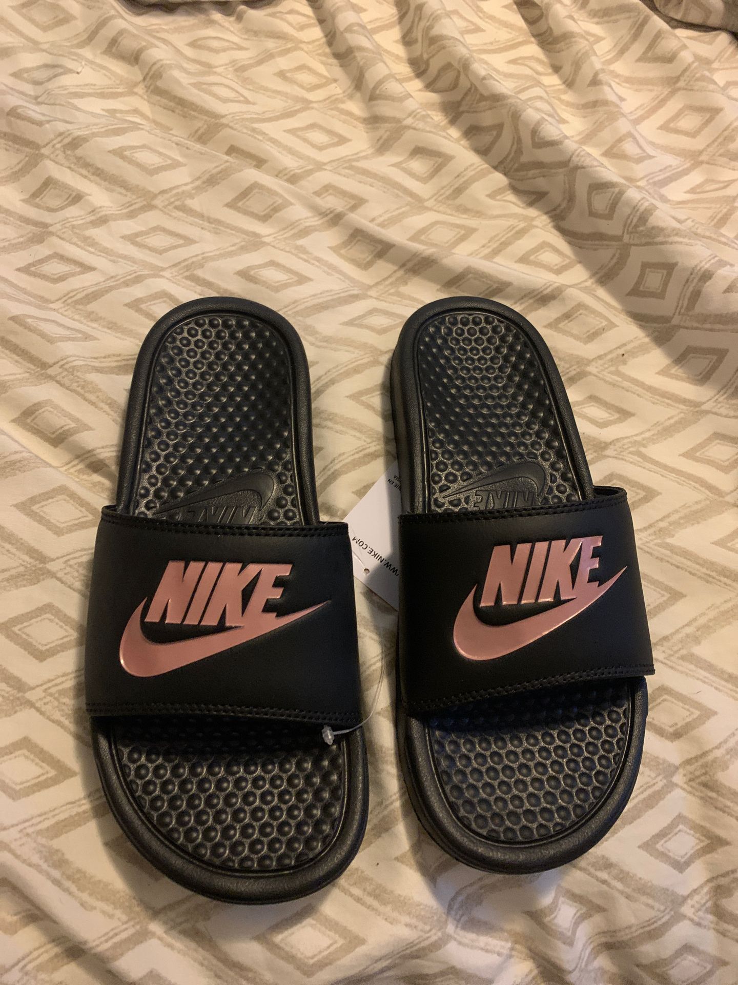 Brand new Nike women’s slide size 7. New in box. Never worn.