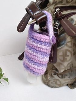 Amigurumi hand sanitizer holder. crochet hand sanitizer pouch. body lotion holder. bag charm. backpack hand sanitizer holder. gel disinfectant