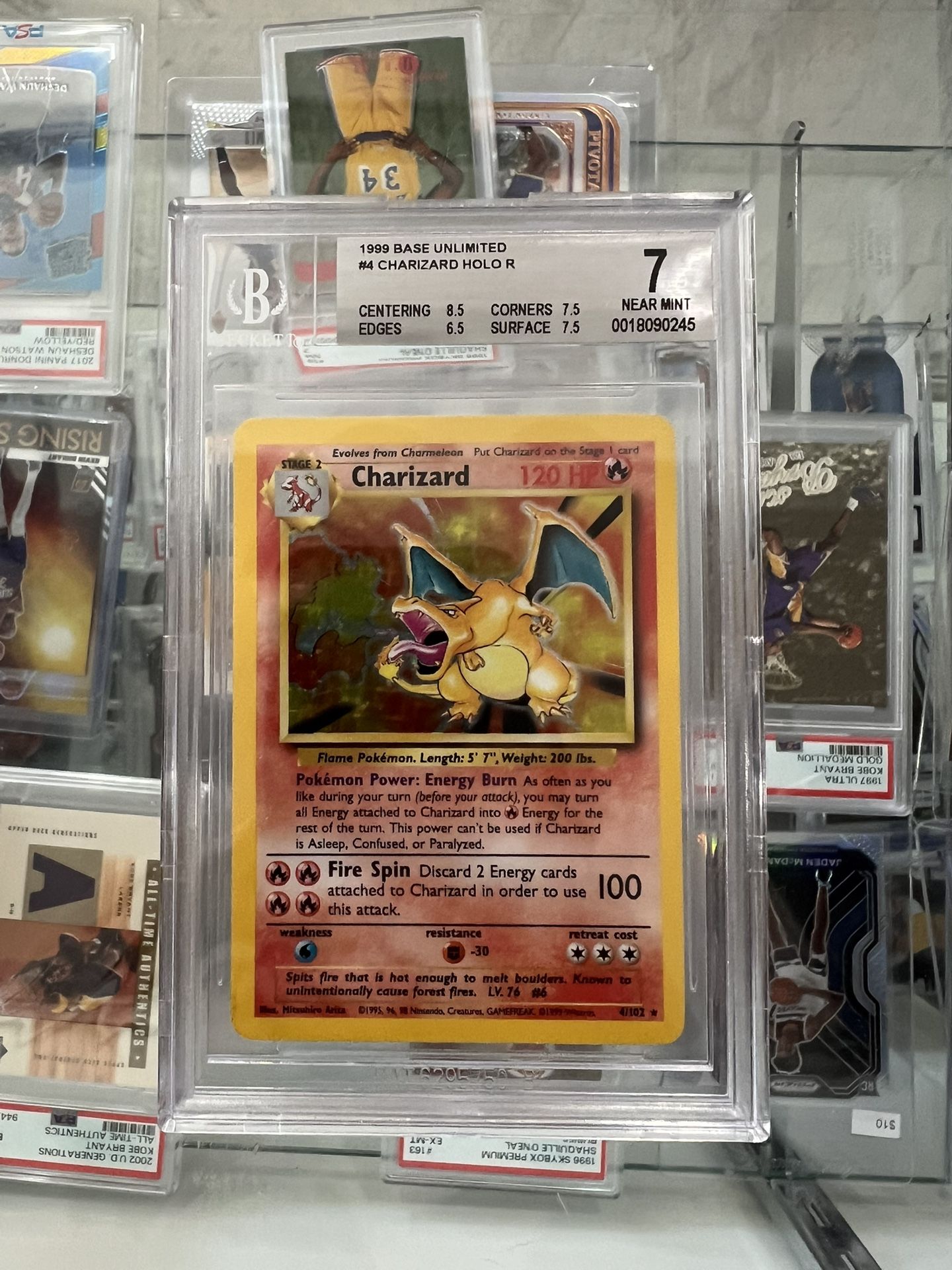 1999 Pokemon Base Set Charizard Unlimited Holo Rare #4/102 BGS 7 NM
