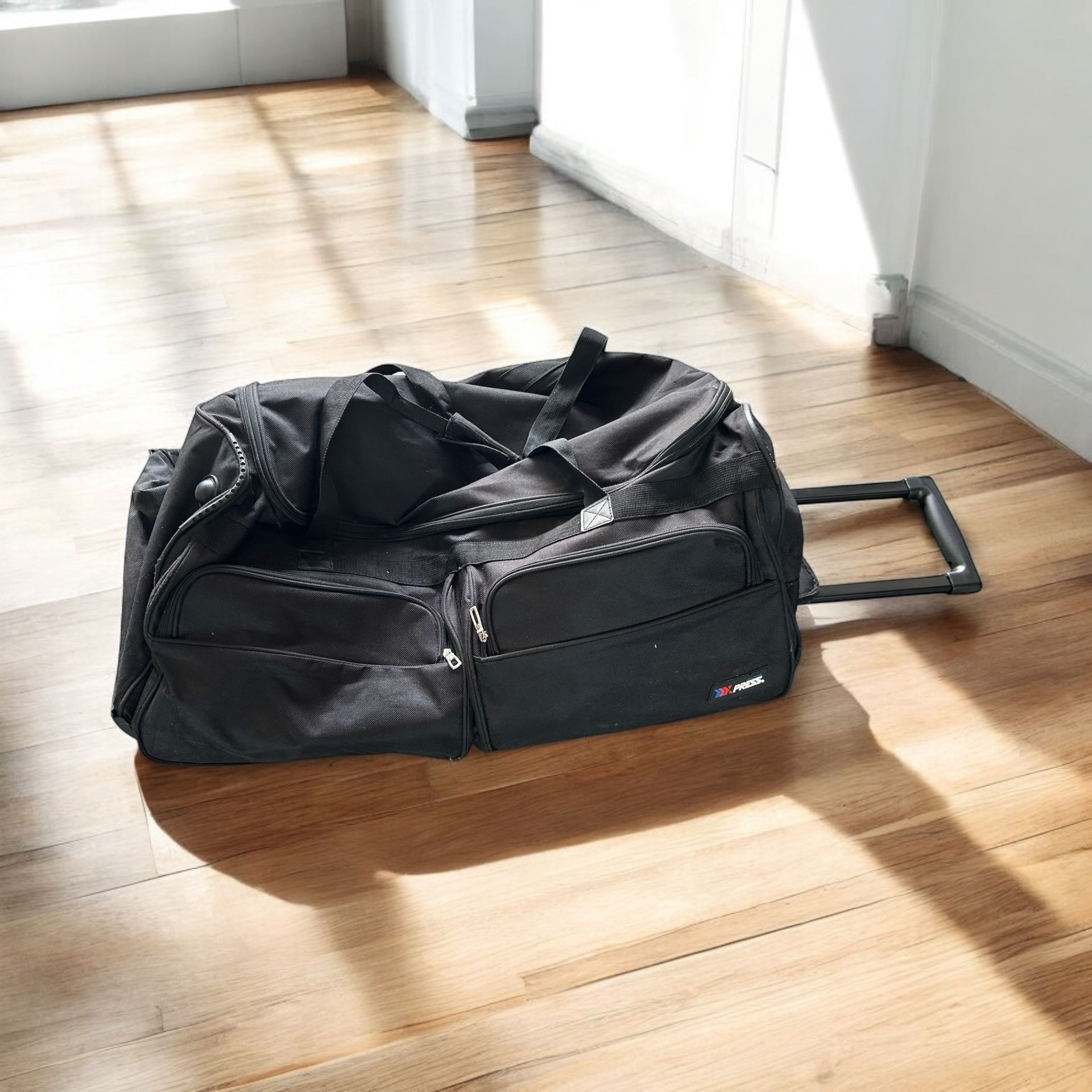 $10 for Black Rolling Duffel Bag