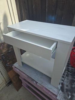 Beautiful  white side table 24 in.wide 22 in tall 12 in. Deep