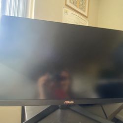 165hz Asus Tuf Monitor With A Keyboard