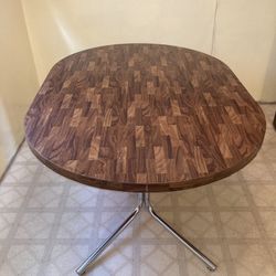 Dining Room Table with 4 Wheeled Cushion Armed Chairs