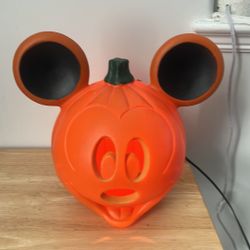 Charming Mickey Mouse pumpkin decor. Perfect for Halloween festivities. Adds a playful touch to your home.  Vintage Mickey Mouse Light Up Jack O Lante