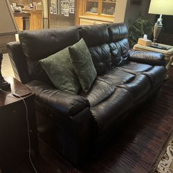 Top Grain Brown Leather Sofa With Dual Power  Recliners.