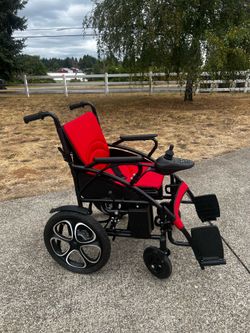 Like new, battery powered wheelchair