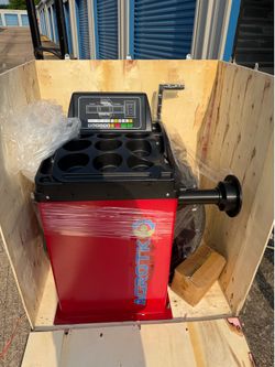 Wheel balancing machine