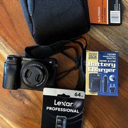 Sony a6000 Mirrorless Camera Bundle – 16–50mm OSS Lens, Bag, 64GB SD, Charger