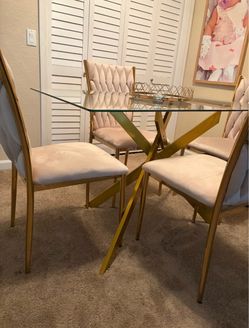 Brand new three months old dining table called with glass top four seats, pet free smoke free selling because I am moving Brand new three months old d