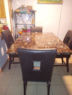 Dining room table and 4 chairs.