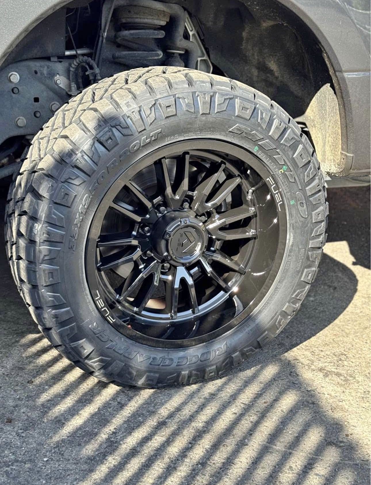 Fuel D760 CLASH 20x10 Rims 33x12.50R20 Nitto Ridge Grappler Tires Ford F250 F350 Excursion Wheels