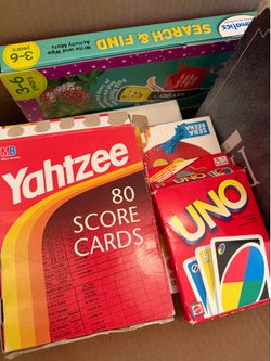 Uno, Game of Life and Yahtzee score cards