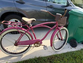 Bike with basket, cup holder and rack on the back