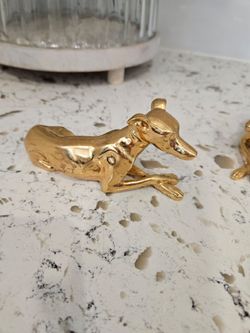 Gold colored Greyhound figurines
