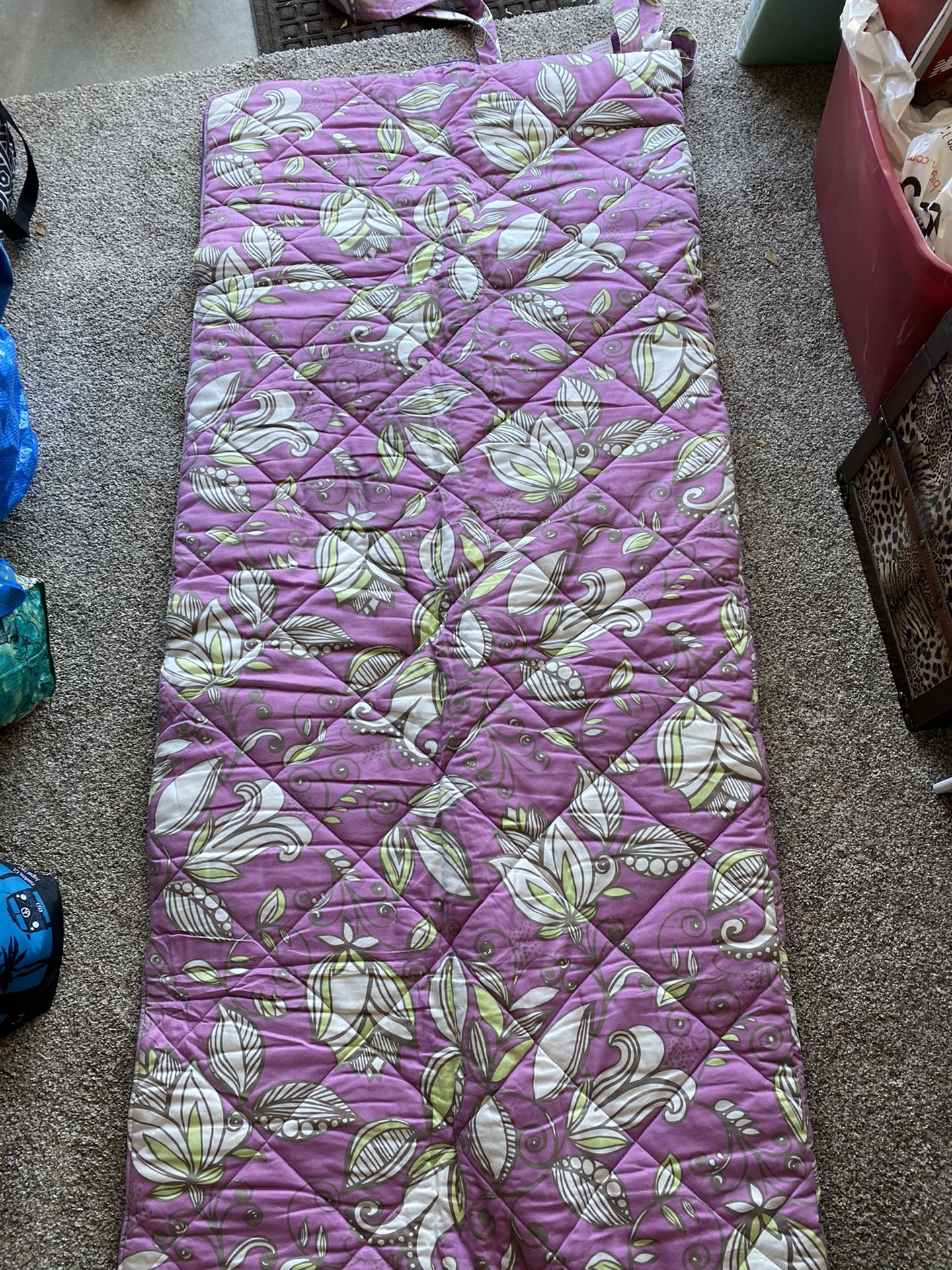 Twin size floral sleeping bag.