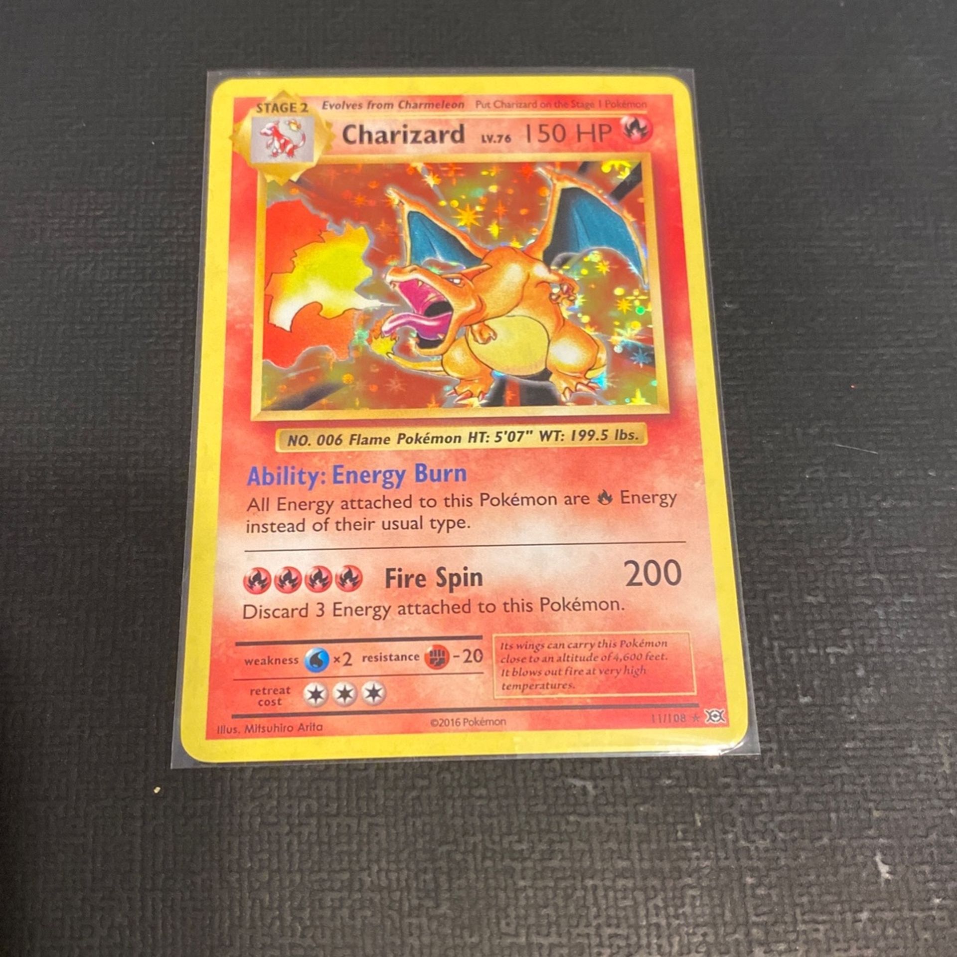 XY Charizard Holo (Will trade for Vivid voltage or darkness Ablaze elite trainer box)