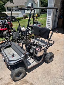 Small golf cart yard buggy