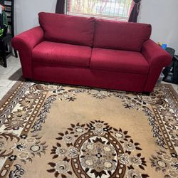 Red Sofa Bed And A LG Washer